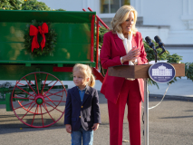 Presidential grandson Beau Biden joins the First Lady at the arrival of the White House Christmas Tree.