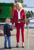 Presidential grandson Beau Biden joins the First Lady at the arrival of the White House Christmas Tree.